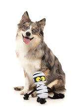 Load image into Gallery viewer, FuzzYard Ryan Gauze-ling plush toy next to a dog for size comparison.