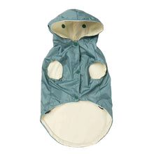 Load image into Gallery viewer, Underside view of the FuzzYard Life Dog Raincoat in myrtle green, showing the cream inner lining, snap-button front, and leg openings.