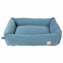 Load image into Gallery viewer, Blue pet bed with a beige label on a white background