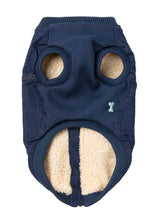 Load image into Gallery viewer, Inside of the FuzzYard Kojima Dog Jacket showing the soft cream sherpa lining and ribbed arm openings.
