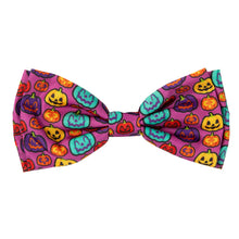 Load image into Gallery viewer, Close-up of FuzzYard pumpkin-themed bowtie with velcro straps. 
