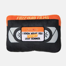 Load image into Gallery viewer, Close-up of Fuzzyard VHS toy, showcasing a horror movie-themed design with crinkle paper and durable stitching for engaging play
