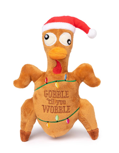 Close up of Gobble till you wobble festive plush dog toy 