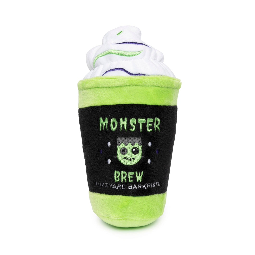 Monster Brew Halloween plush squeaky dog toy shaped like a coffee cup, featuring vibrant colors and a fun squeaker inside. Perfect for playful pups during the Halloween season, offering soft and durable fabric for safe chewing.  Fuzzyard Dog Toy