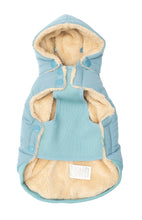 Load image into Gallery viewer, Inside view of the Fuzzyard Essentials blue dog puffer jacket showing soft fleece lining and detachable hood.
