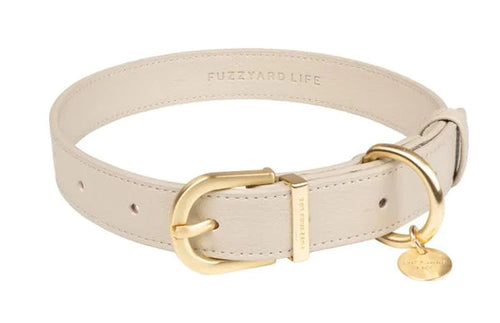 Close-up detail of the Fuzzyard Life Atelier Dog Collar in Sandstone showing vegan leather and gold hardware