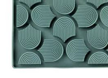 Load image into Gallery viewer, Close up of FuzzYard Life Hide &amp; Treat Mat Myrtle Green textured fabric
