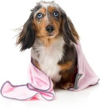 Load image into Gallery viewer, Puppy wrapped in a pink FuzzYard microfibre drying towel after bath time
