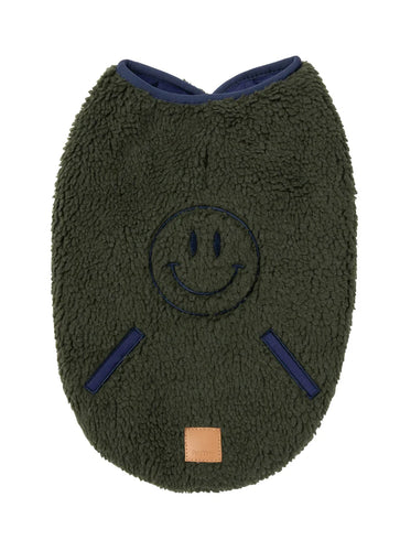 Dark moss green sherpa dog jacket with embroidered smiley face and navy trim, displayed flat on a white background.
